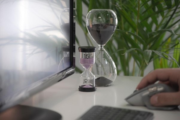 TTT_Blog-Timeless-Methods-of-Improving-Your-Productivity-Featured-Image.jpg clear hour glass on white table